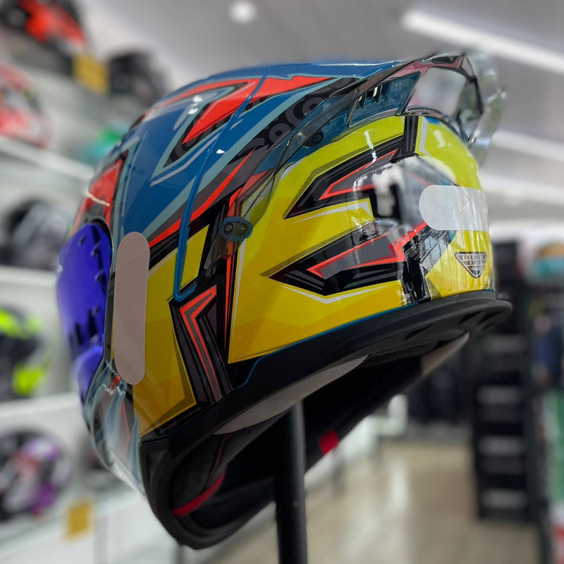 Capacete TEXX RAPTOR ARCADE AZUL VERDE ROSA BRILHO