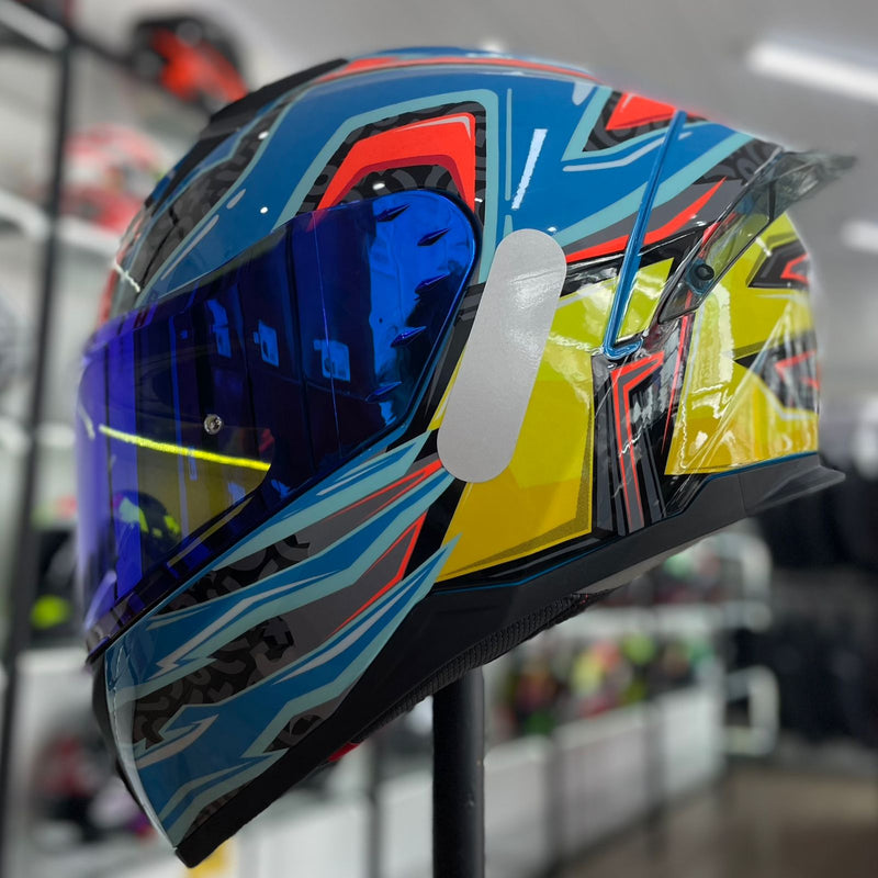 Capacete TEXX RAPTOR ARCADE AZUL VERDE ROSA BRILHO
