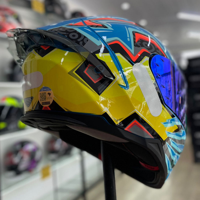 Capacete TEXX RAPTOR ARCADE AZUL VERDE ROSA BRILHO